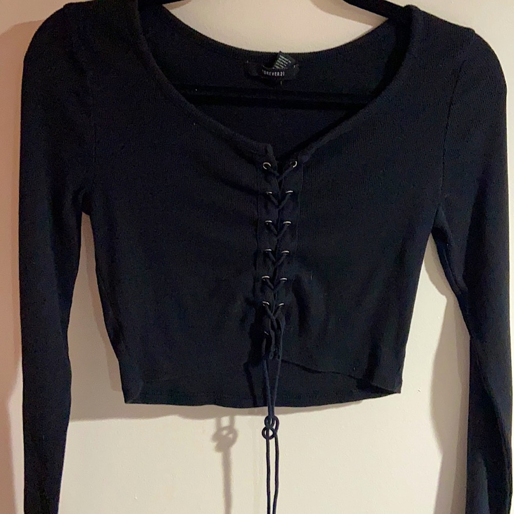 Black long sleeve top.